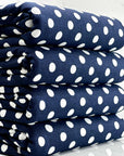 (COTTON SPANDEX) OFF WHITE POLKA DOTS ON NAVY