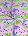 (FRENCH TERRY) DINOSAURS ON LAVENDER