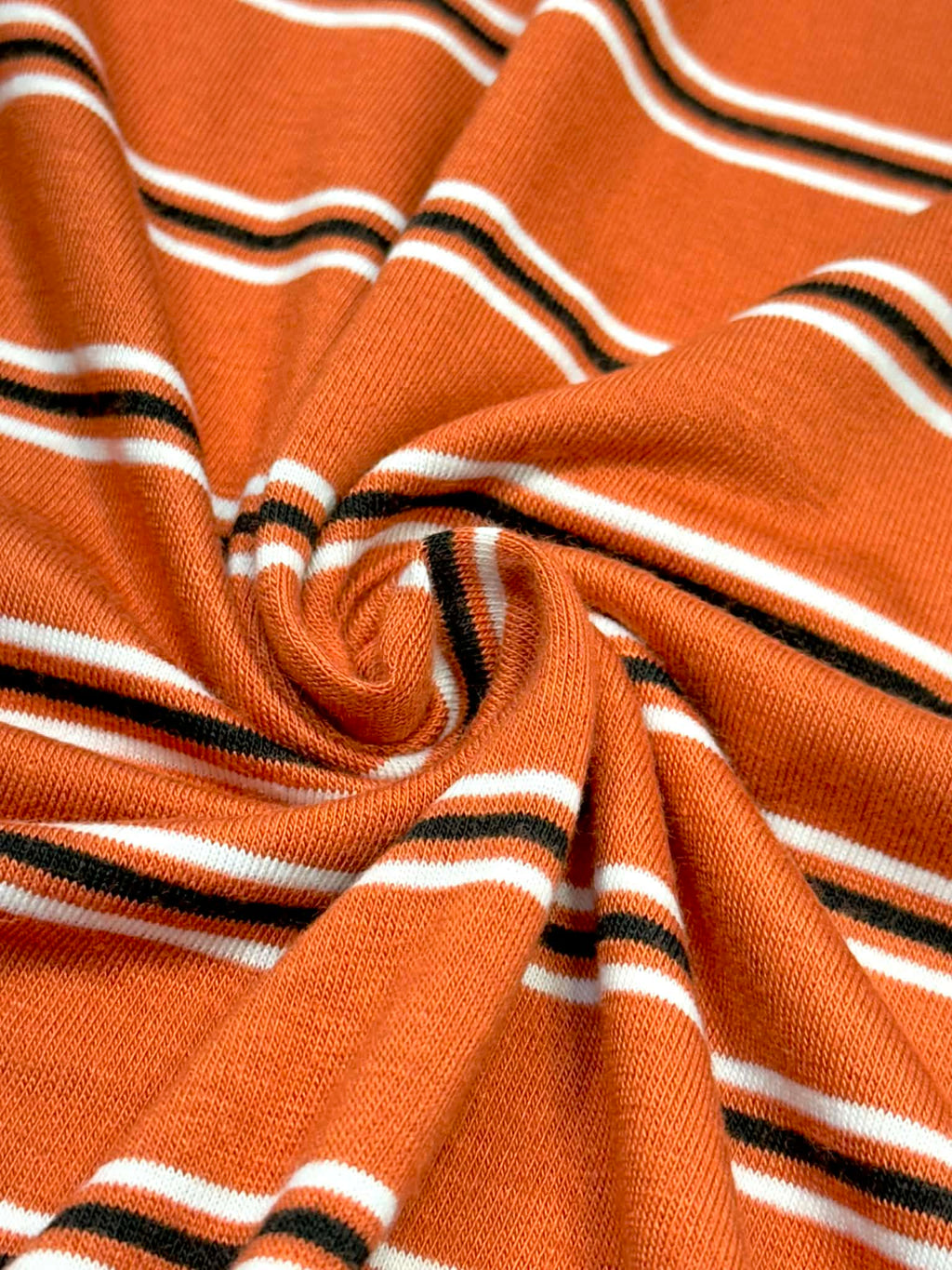 (RAYON MODAL) BLACK AND OFF WHITE STRIPES ON DARK ORANGE (3)