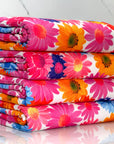 (YUMMY RIB) PINK, ORANGE, PURPLE, AND BLUE FLOWERS ON OFF WHITE (1)