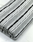 (KNIT) GRAY, OFF WHITE, AND BLACK STRIPES