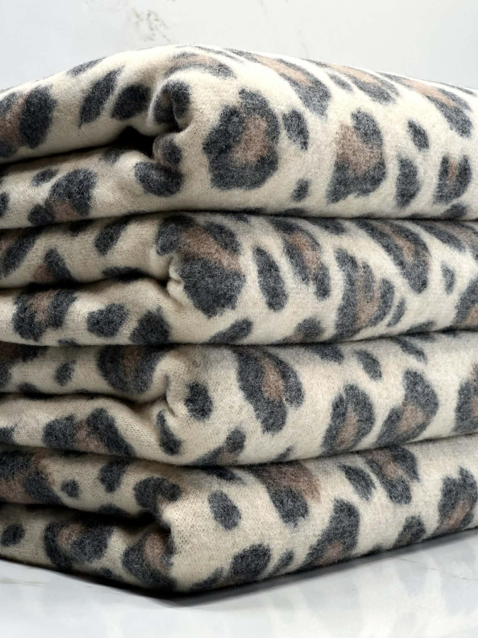 (BRUSHED SWEATER KNIT) BLACK AND BROWN CHEETAH ON CREAM