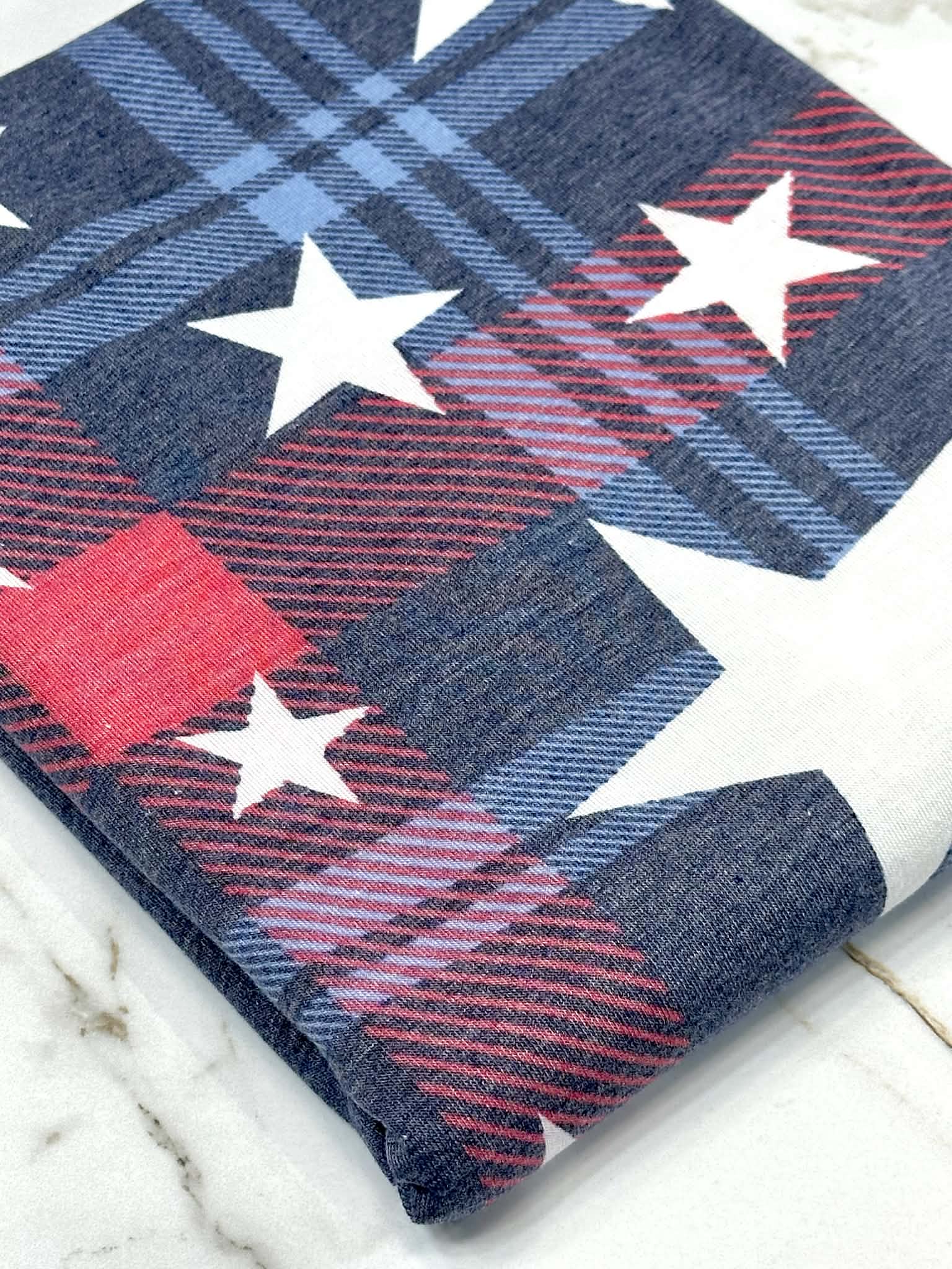 (KNIT) OFF WHITE STARS ON NAVY AND RED PLAID