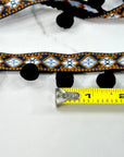 (TRIM) NAVY AND BLUE AZTEC PATTERN WITH BLACK POM POM BALL