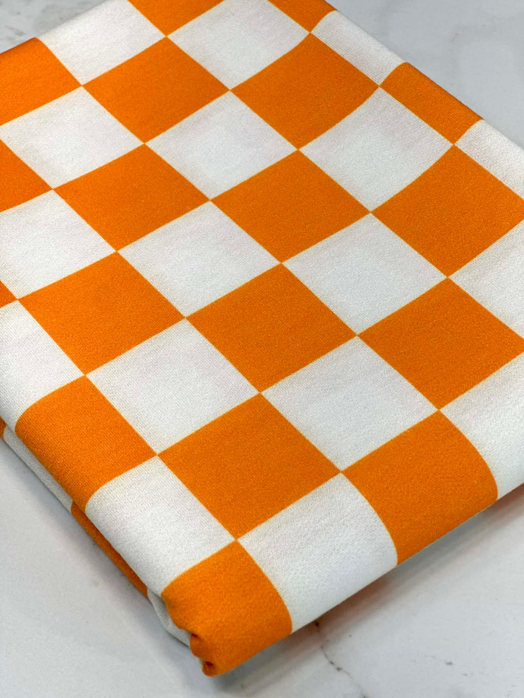 (FRENCH TERRY) ORANGE AND OFF WHITE CHECKERED