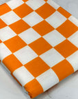 (FRENCH TERRY) ORANGE AND OFF WHITE CHECKERED