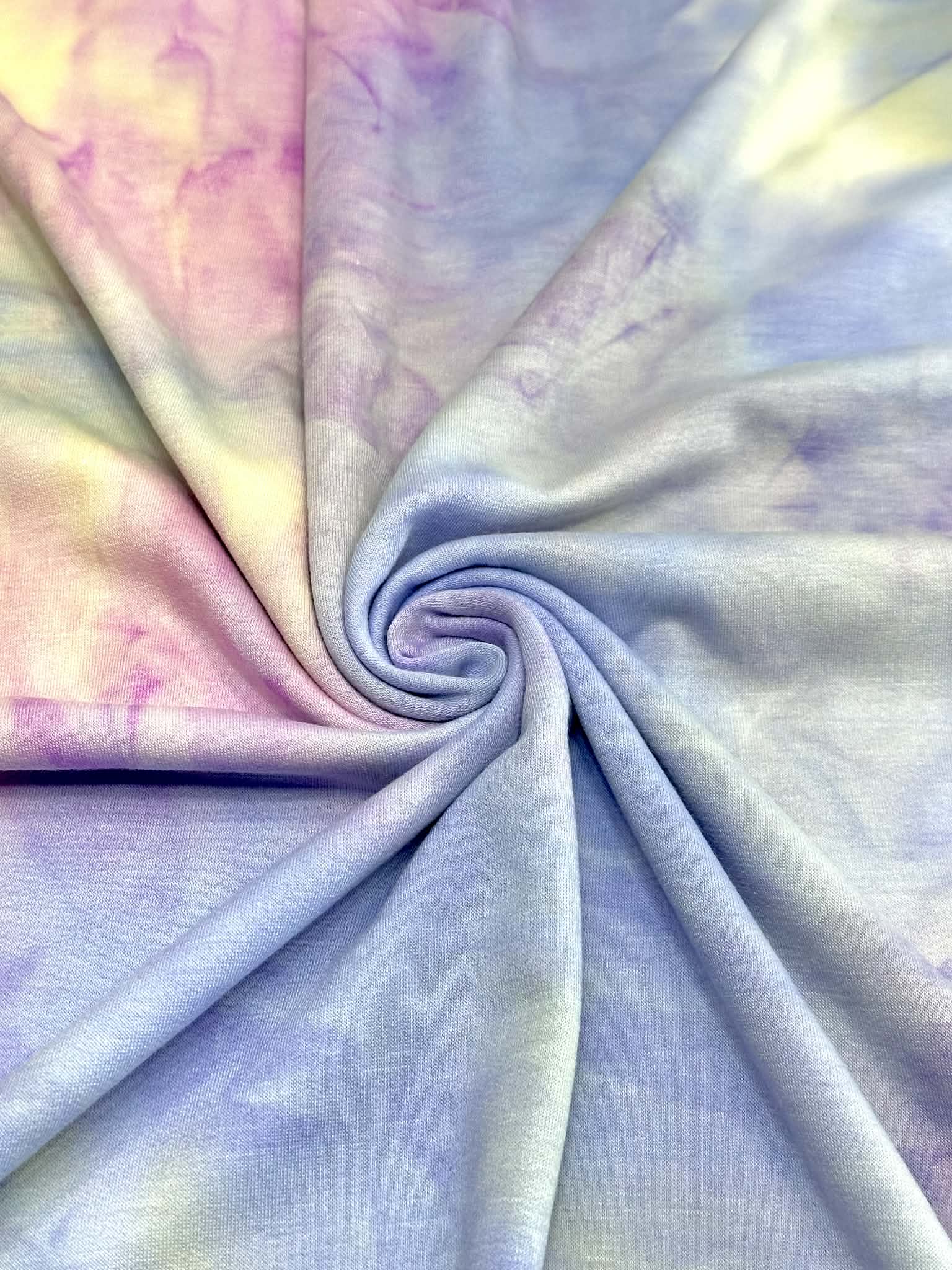 (FRENCH TERRY) BLUE, YELLOW AND PURPLE TIE DYE (1)
