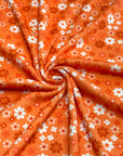(2X2 YUMMY RIB) BURNT ORANGE AND OFF WHITE TINY FLOWERS ON ORANGE