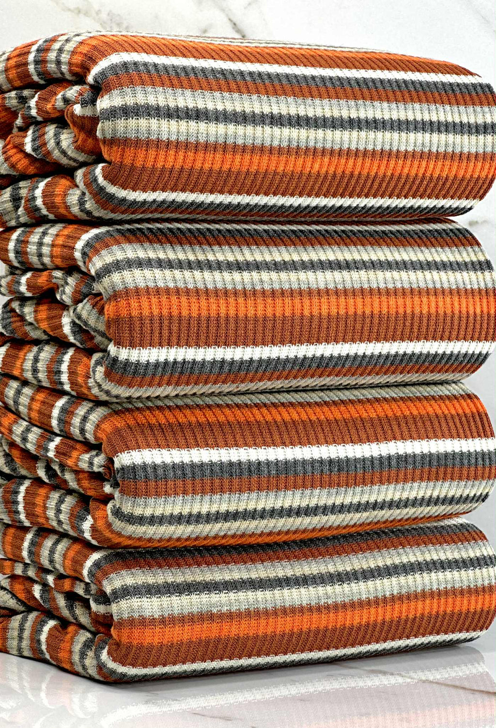 (SWEATER RIB) ORANGE, RUST, GRAY, AND OFF WHITE STRIPES