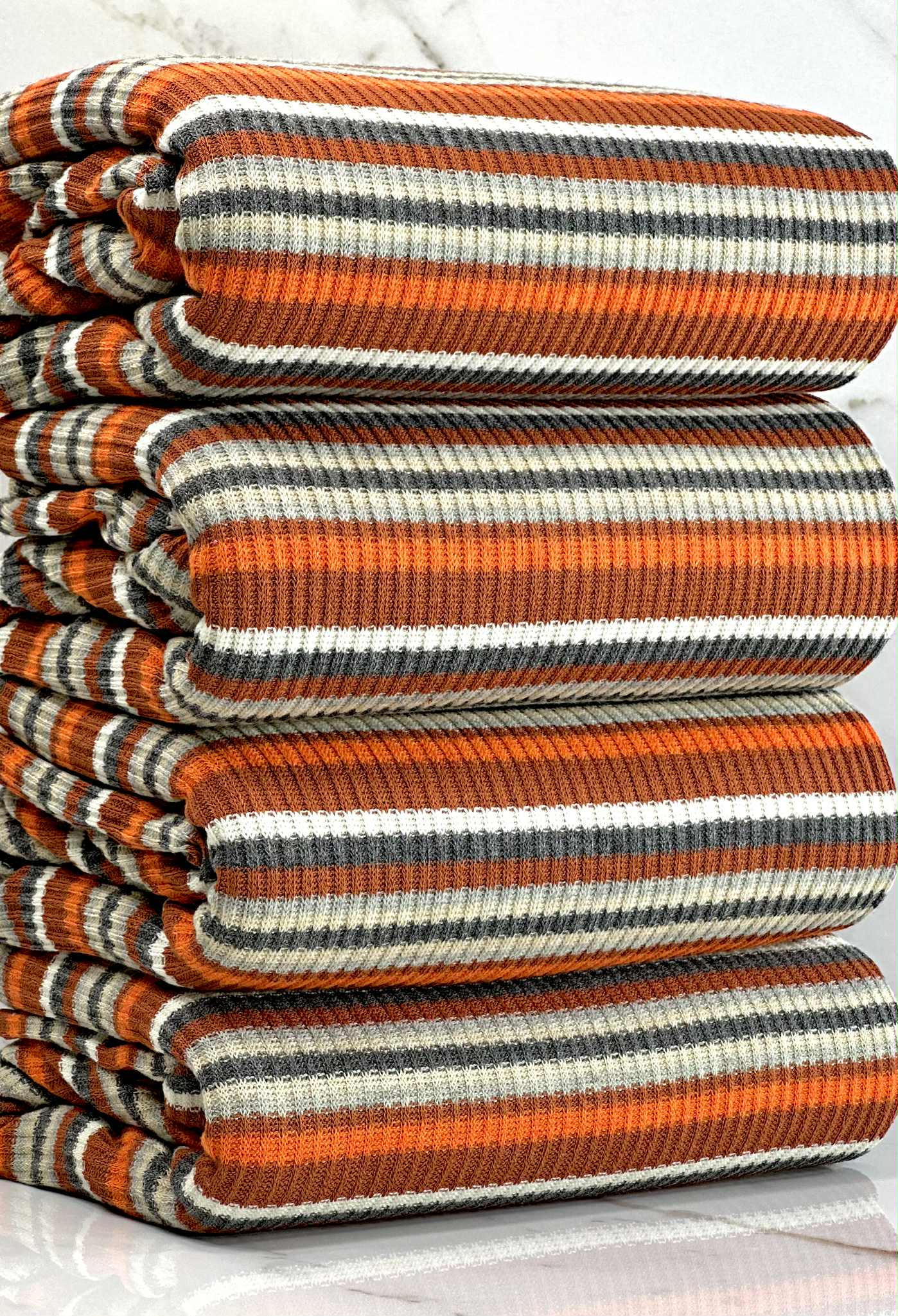 (SWEATER RIB) ORANGE, RUST, GRAY, AND OFF WHITE STRIPES