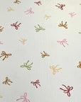 (4X2 RIB) LIGHT MUSTARD, BROWN, PINK AND GREEN BOWS ON CREAM