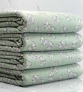 (KNIT) OFF WHITE POLKA DOT BOWS ON LIGHT SAGE