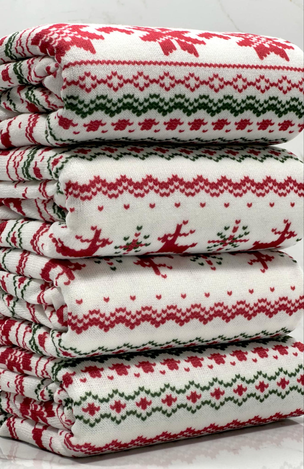 (SWEATER KNIT) RED REINDEERS AND RED POINSETTIA'S ON OFF WHITE