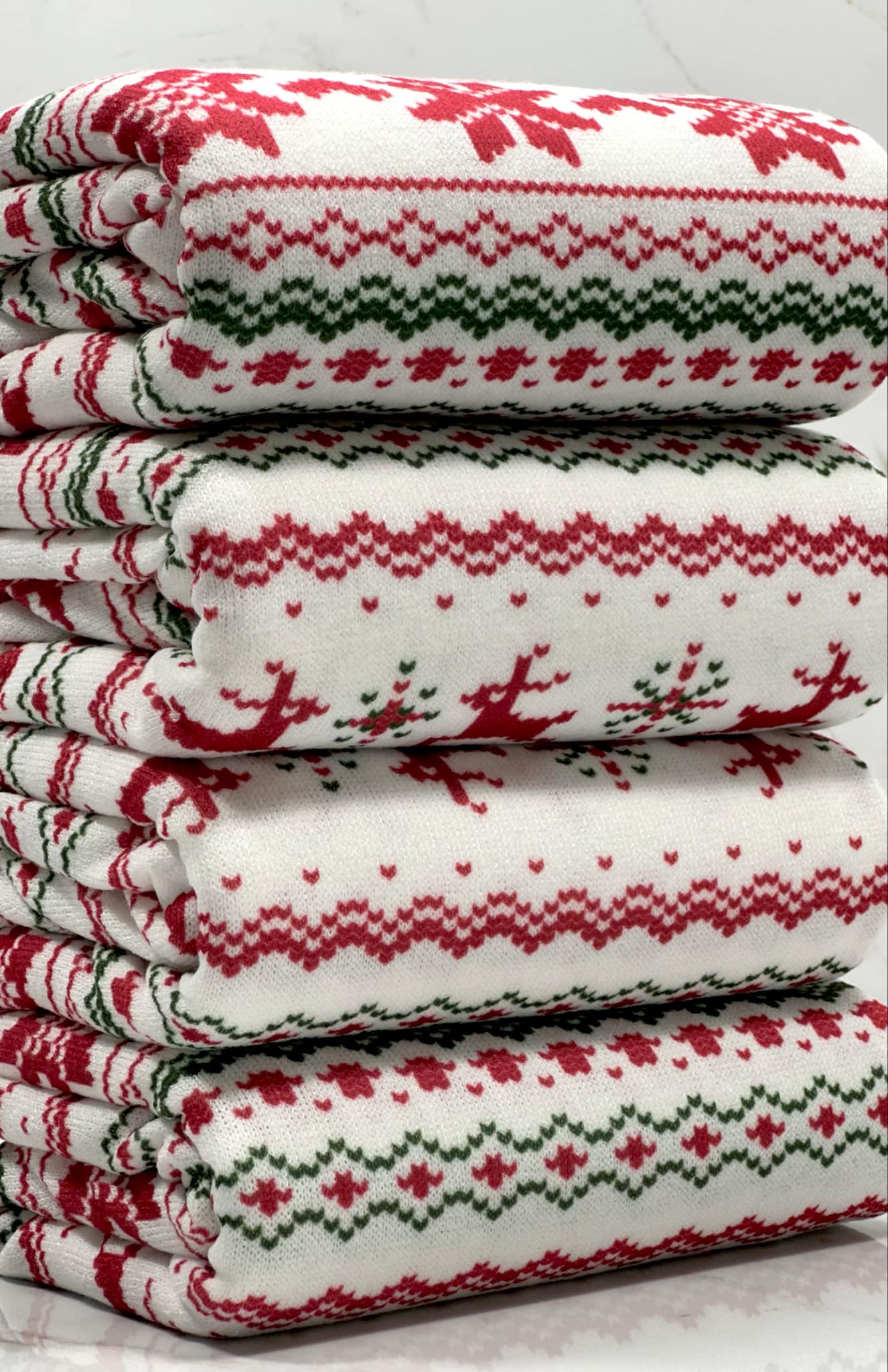 (SWEATER KNIT) RED REINDEERS AND RED POINSETTIA'S ON OFF WHITE