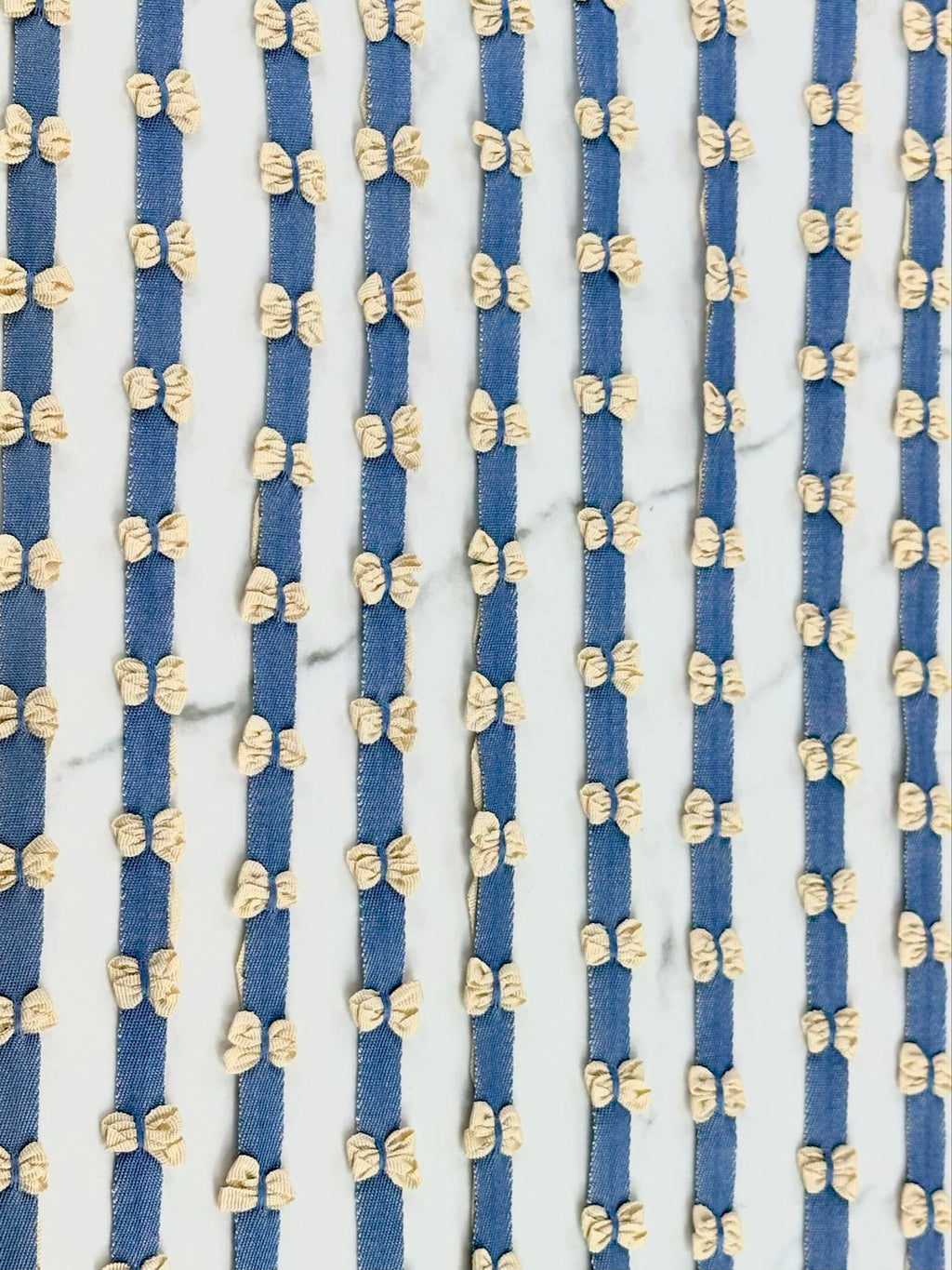 (TRIM) CREAM BOWS ON DENIM STRIP