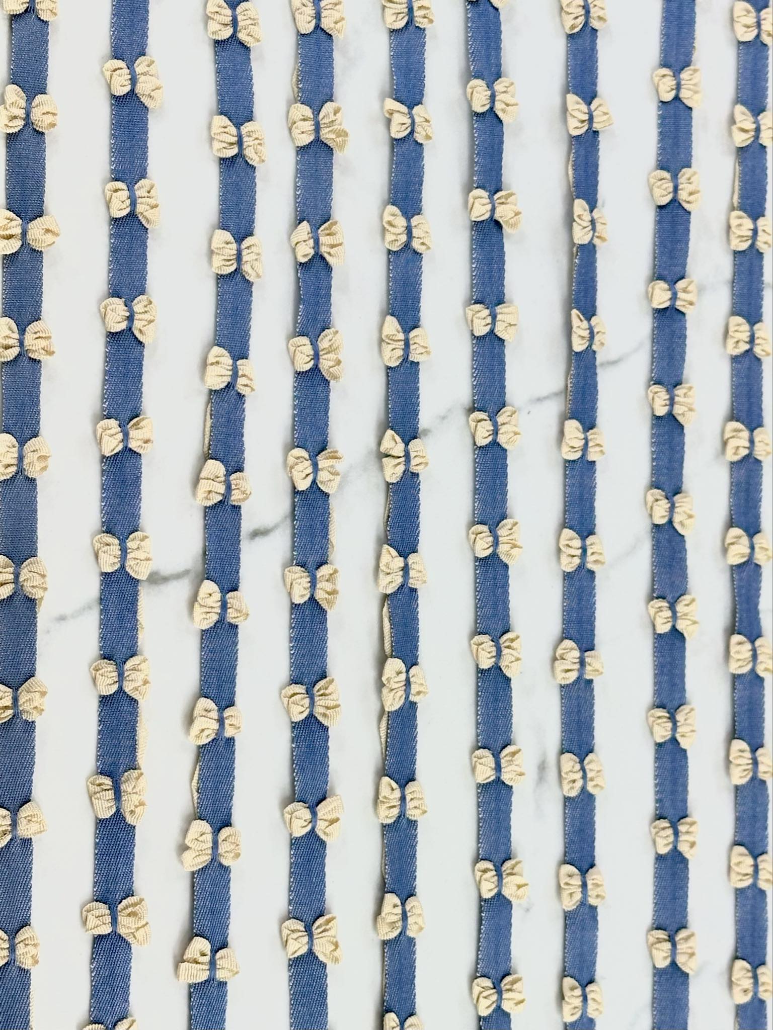 (TRIM) CREAM BOWS ON DENIM STRIP