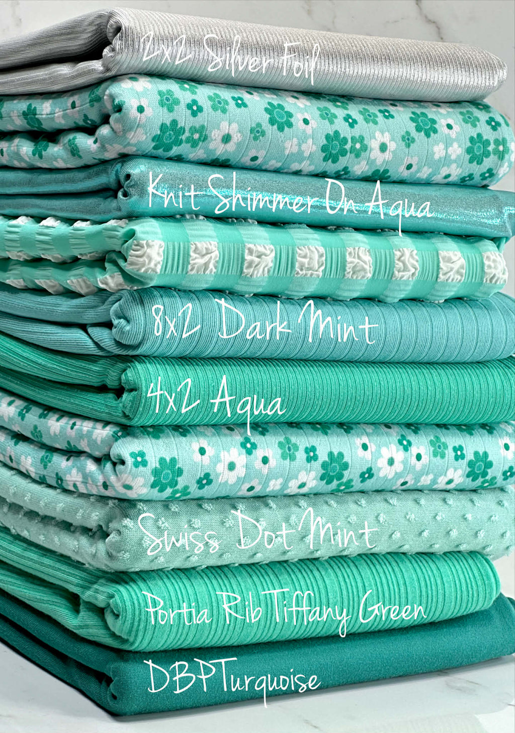 (POINTELLE RIB) TURQUOISE AND OFF WHITE TINY FLOWERS ON AQUA(2)