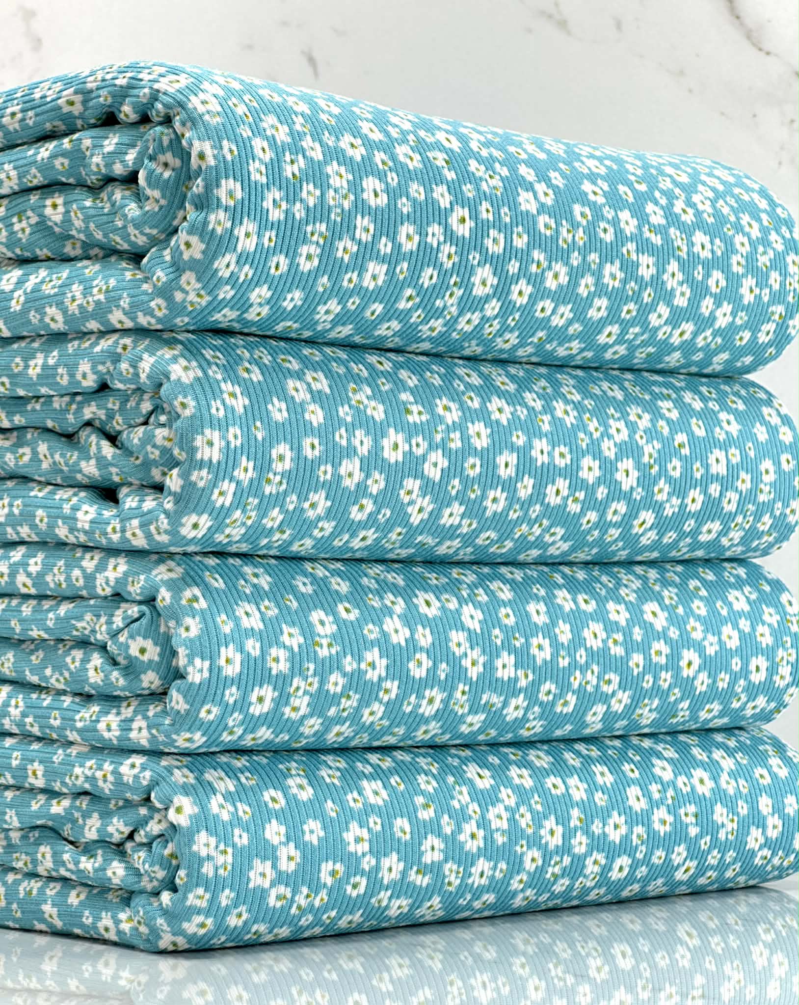 (2X1 YUMMY RIB) TINY WHITE FLOWERS ON OCEAN BLUE
