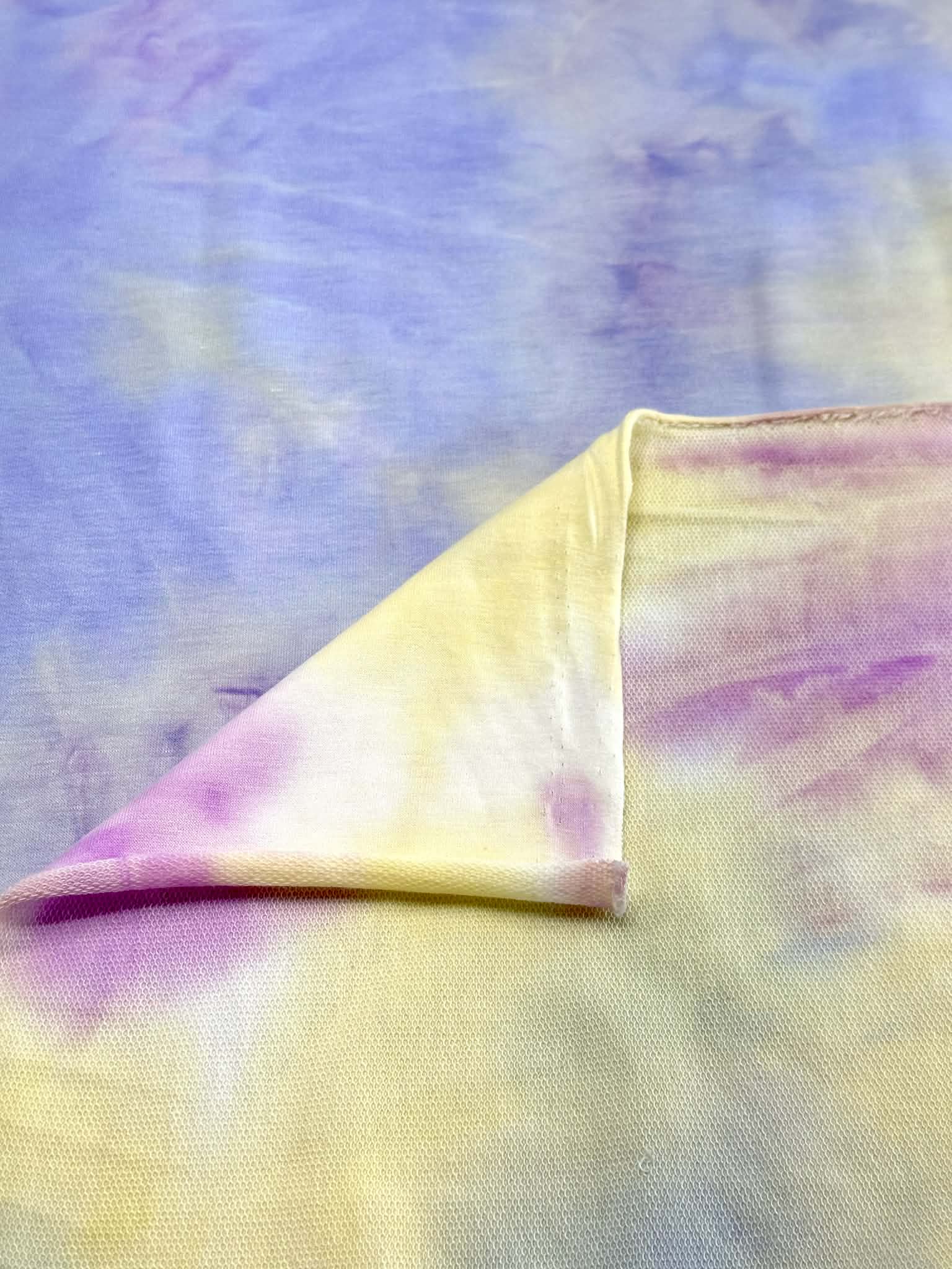 (FRENCH TERRY) BLUE, YELLOW AND PURPLE TIE DYE (1)