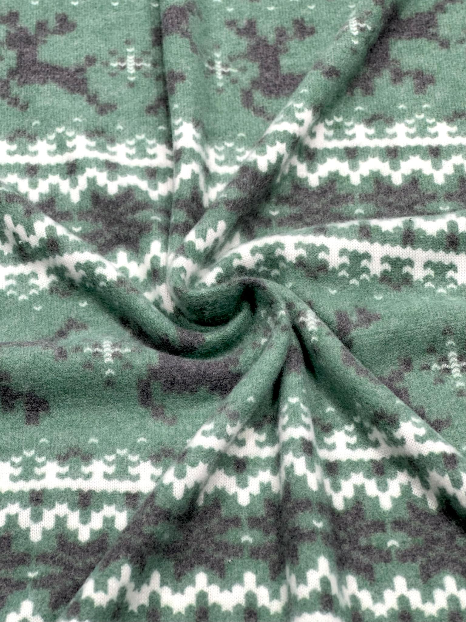 (BRUSHED SWEATER KNIT) BLACK REINDEERS ON DARK GREEN