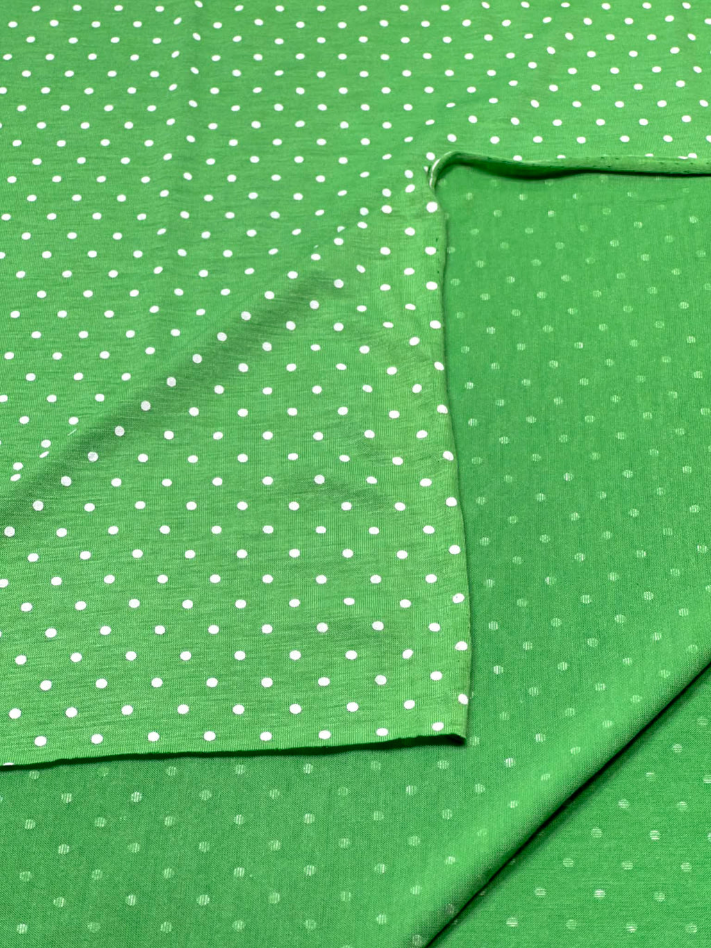 (KNIT) TINY OFF WHITE POLKA DOTS ON GREEN