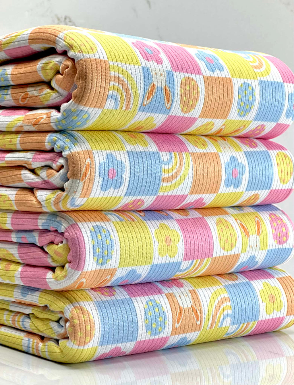(4X2 YUMMY RIB) BUNNYS, EGGS, RAINBOWS, AND FLOWERS, CHECKERED PATTERN (1)