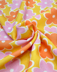 (POLYESTER) PINK AND ORANGE FLOWERS ON MUSTARD