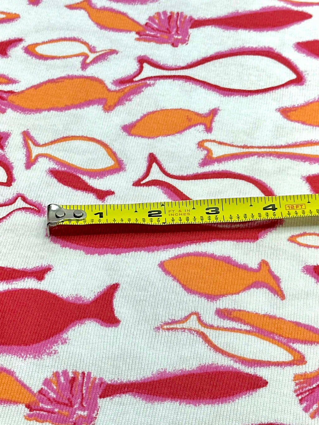 (COTTON BABY RIB) PINK, ORANGE AND RED FISH ON OFF WHITE