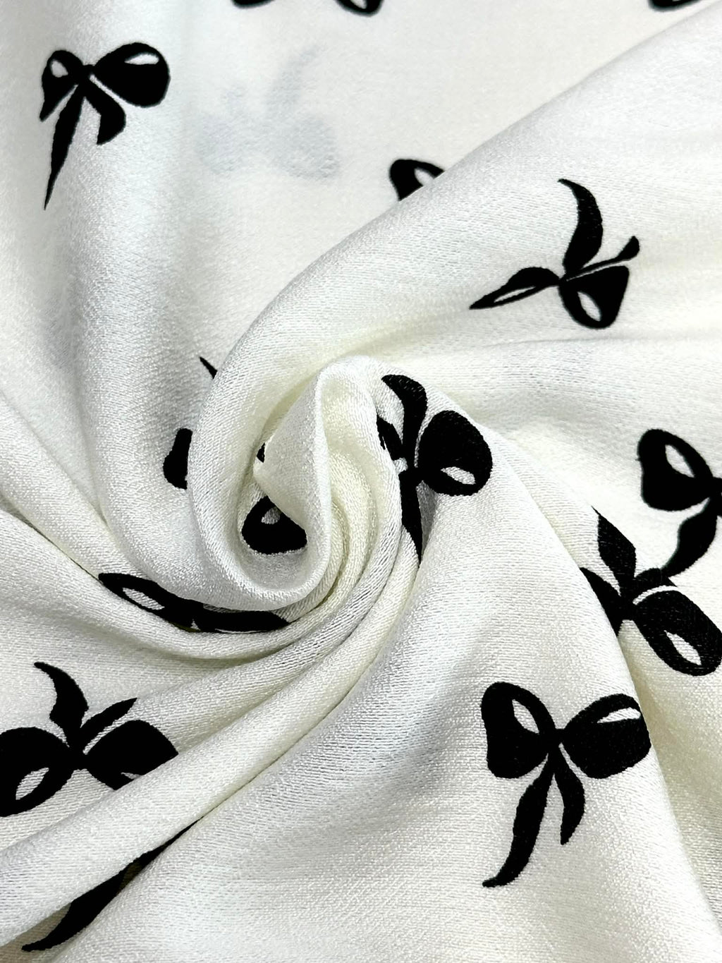 (WOVEN) BLACK BOWS ON OFF WHITE