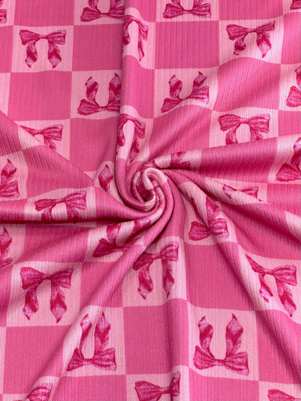 (4X2 RIB) HOT PINK BOWS ON PINK MEDIUM CHECKERED