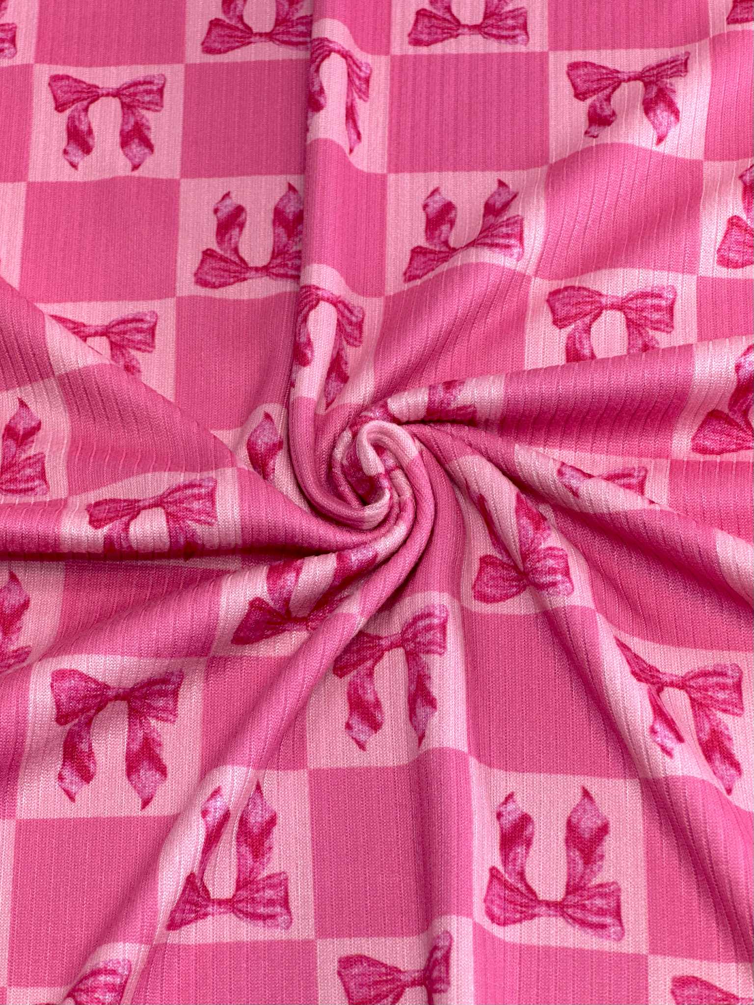 (4X2 RIB) HOT PINK BOWS ON PINK MEDIUM CHECKERED