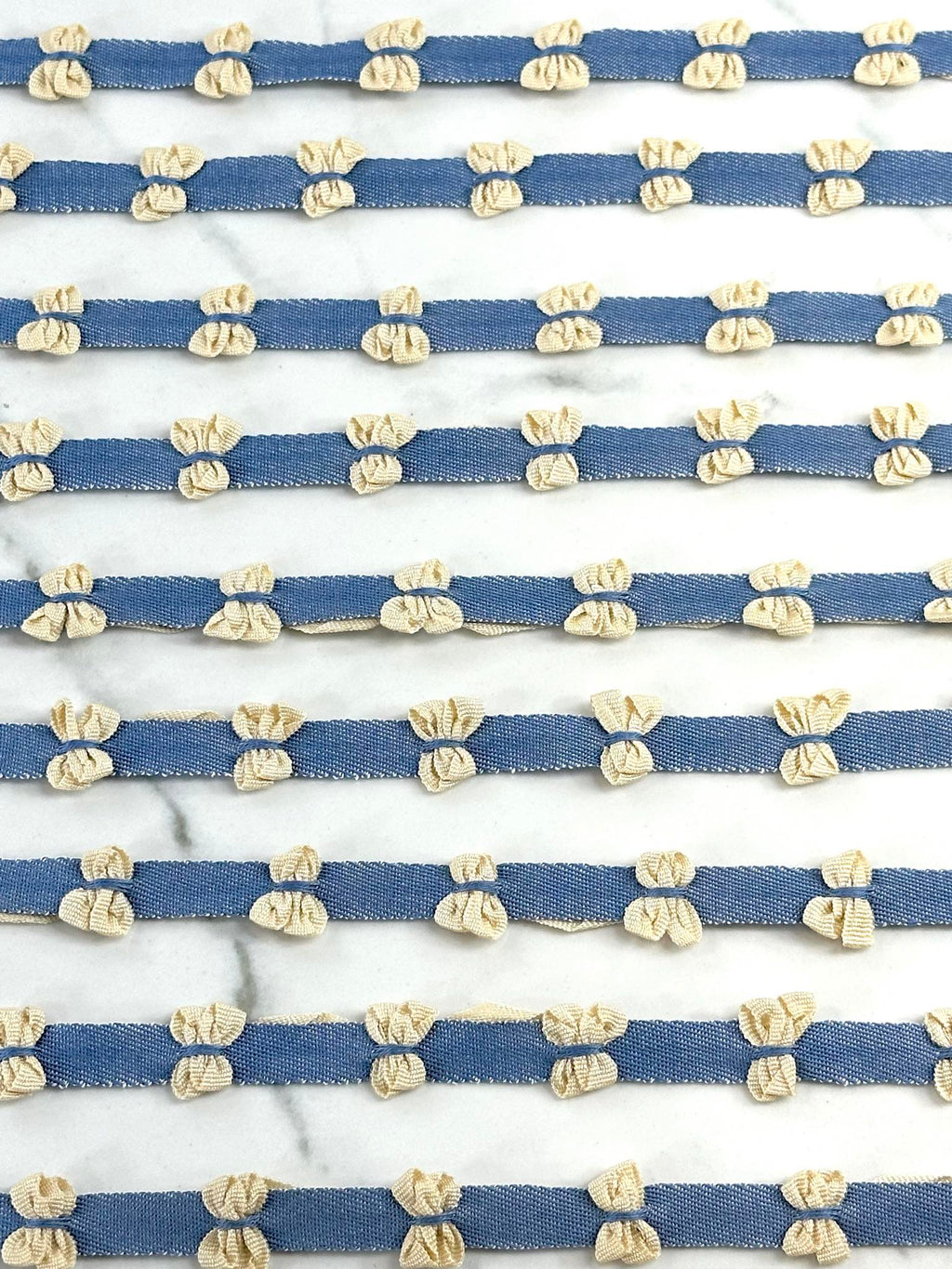 (TRIM) CREAM BOWS ON DENIM STRIP