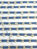 (TRIM) CREAM BOWS ON DENIM STRIP