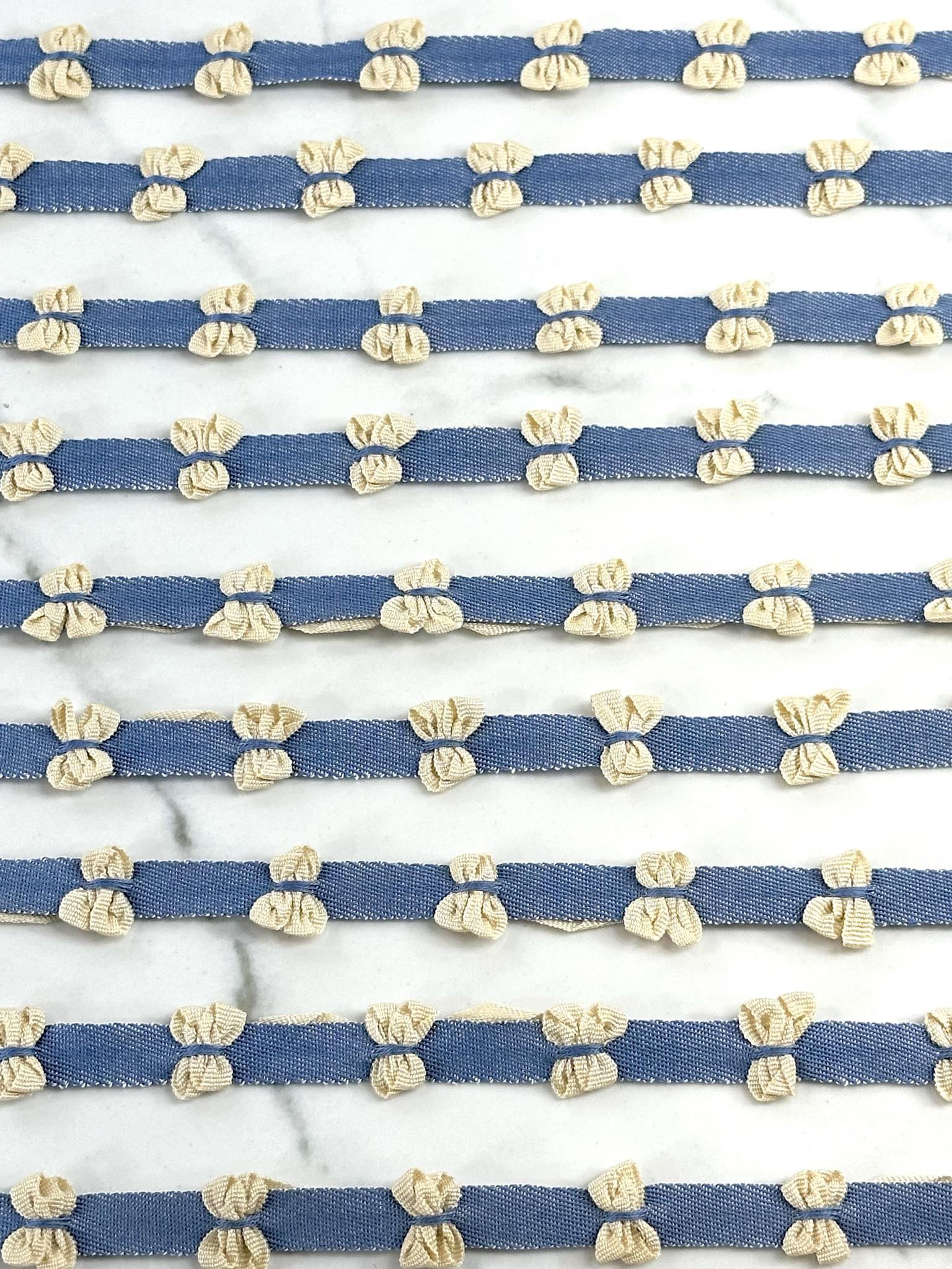(TRIM) CREAM BOWS ON DENIM STRIP