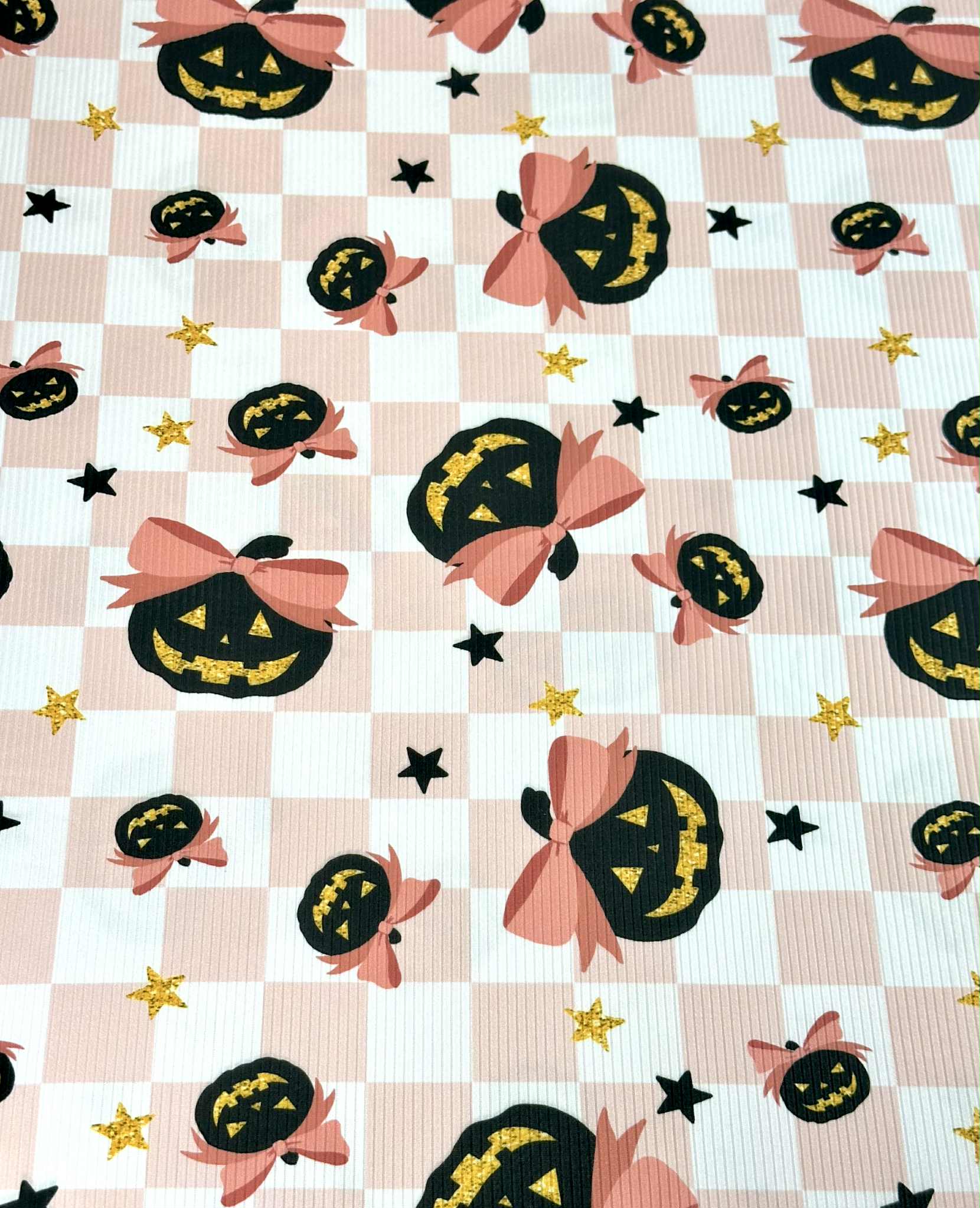 (YUMMY RIB) BLACK PUMPKINS WITH BOWS AND STARS ON LIGHT PINK CHECKERED
