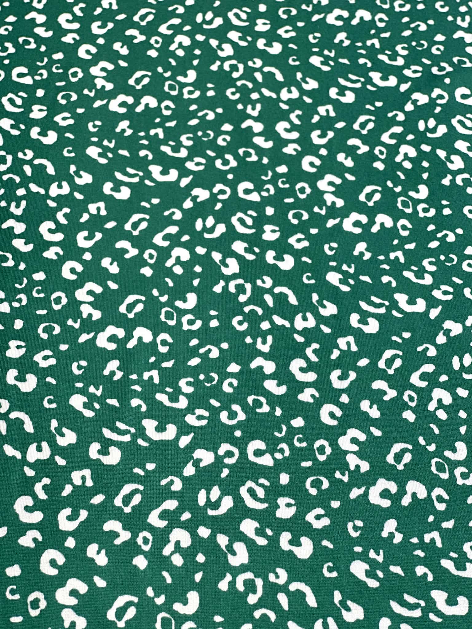 (DBP) TINY WHITE LEOPARD ON HUNTER GREEN