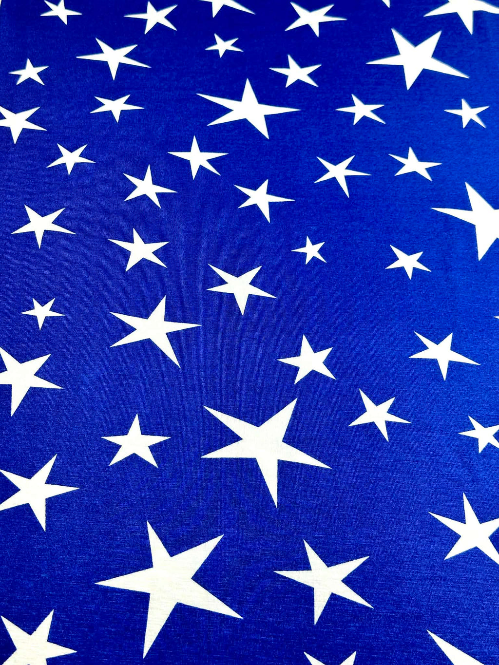 (RAYON MODAL) OFF WHITE STARS ON ROYAL