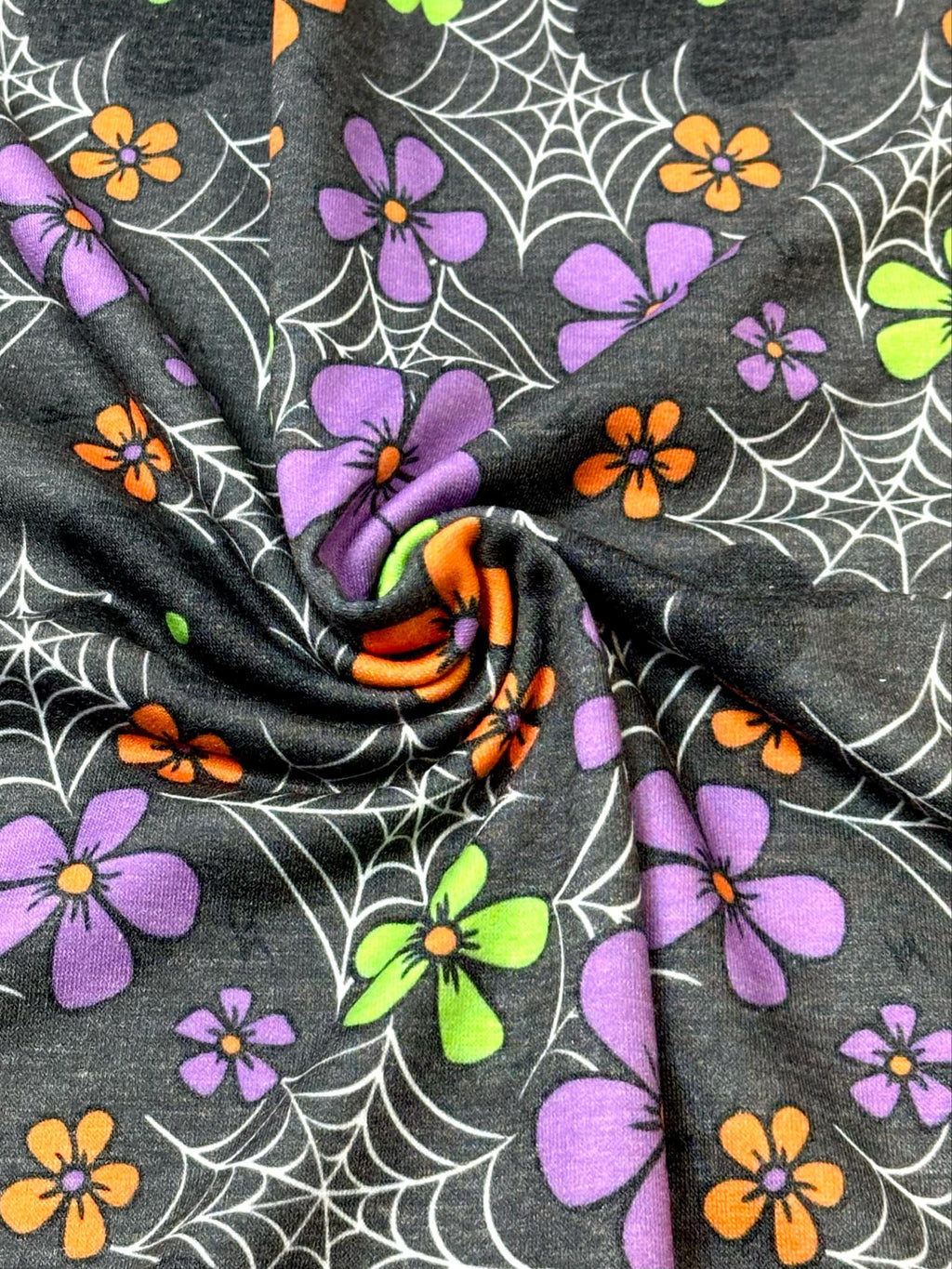 (FRENCH TERRY) SMALL COLORFUL FLOWERS & SPIDERWEBS ON CHARCOAL