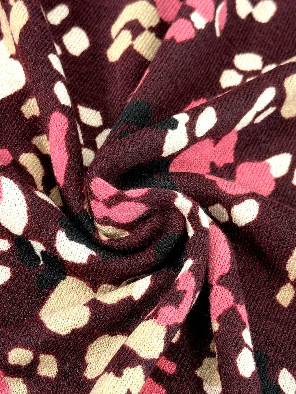 (HACCI SWEATER KNIT) PINK, IVORY, AND BLACK LEOPARD ON BURGUNDY