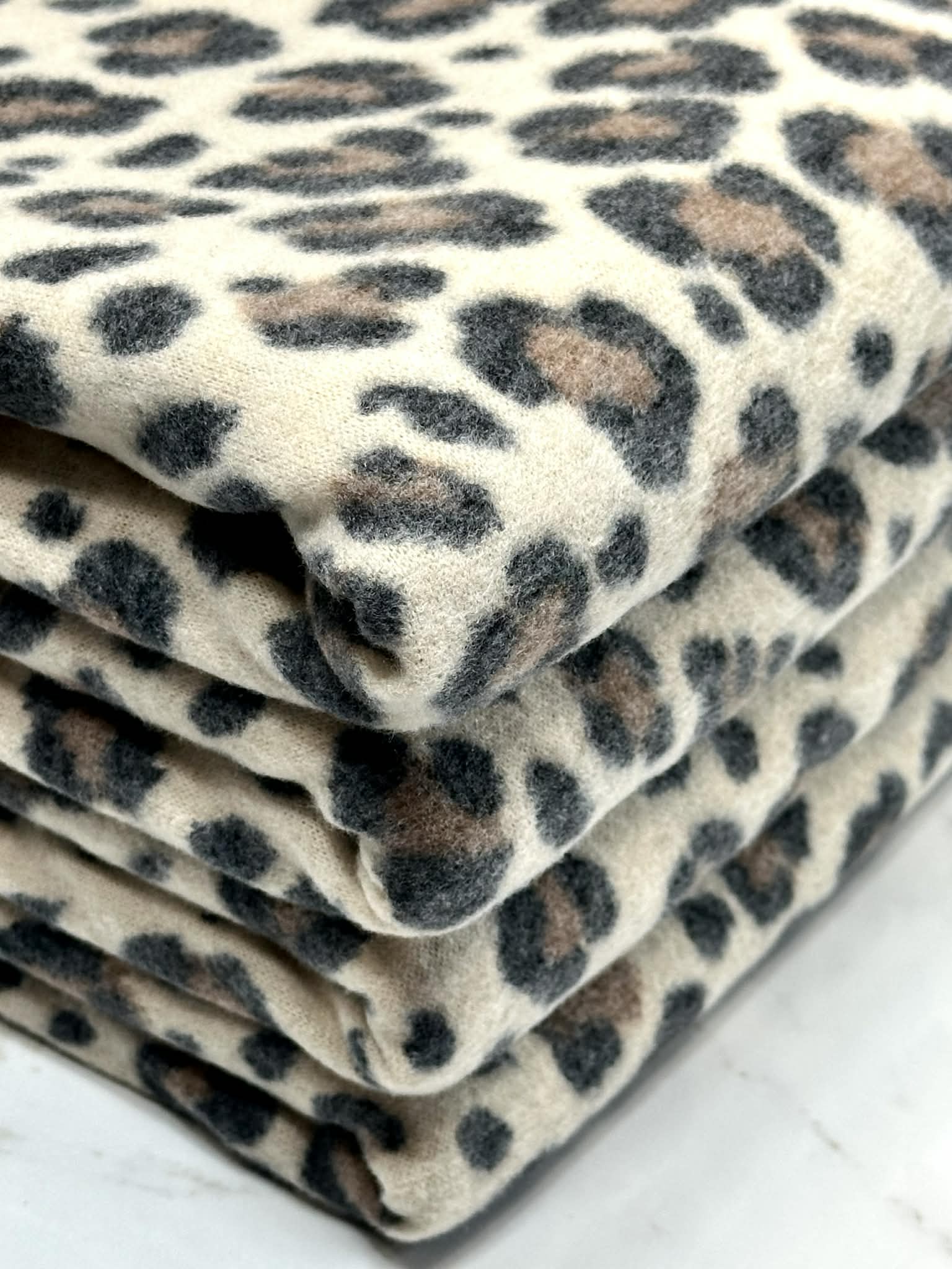 (BRUSHED SWEATER KNIT) BLACK AND BROWN CHEETAH ON CREAM