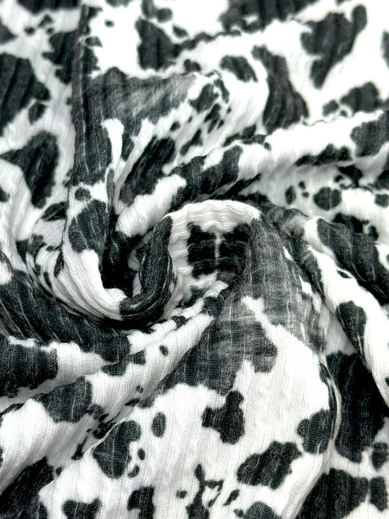 (URBAN RIB) SMALL BLACK COW FUR PRINT ON OFF WHITE