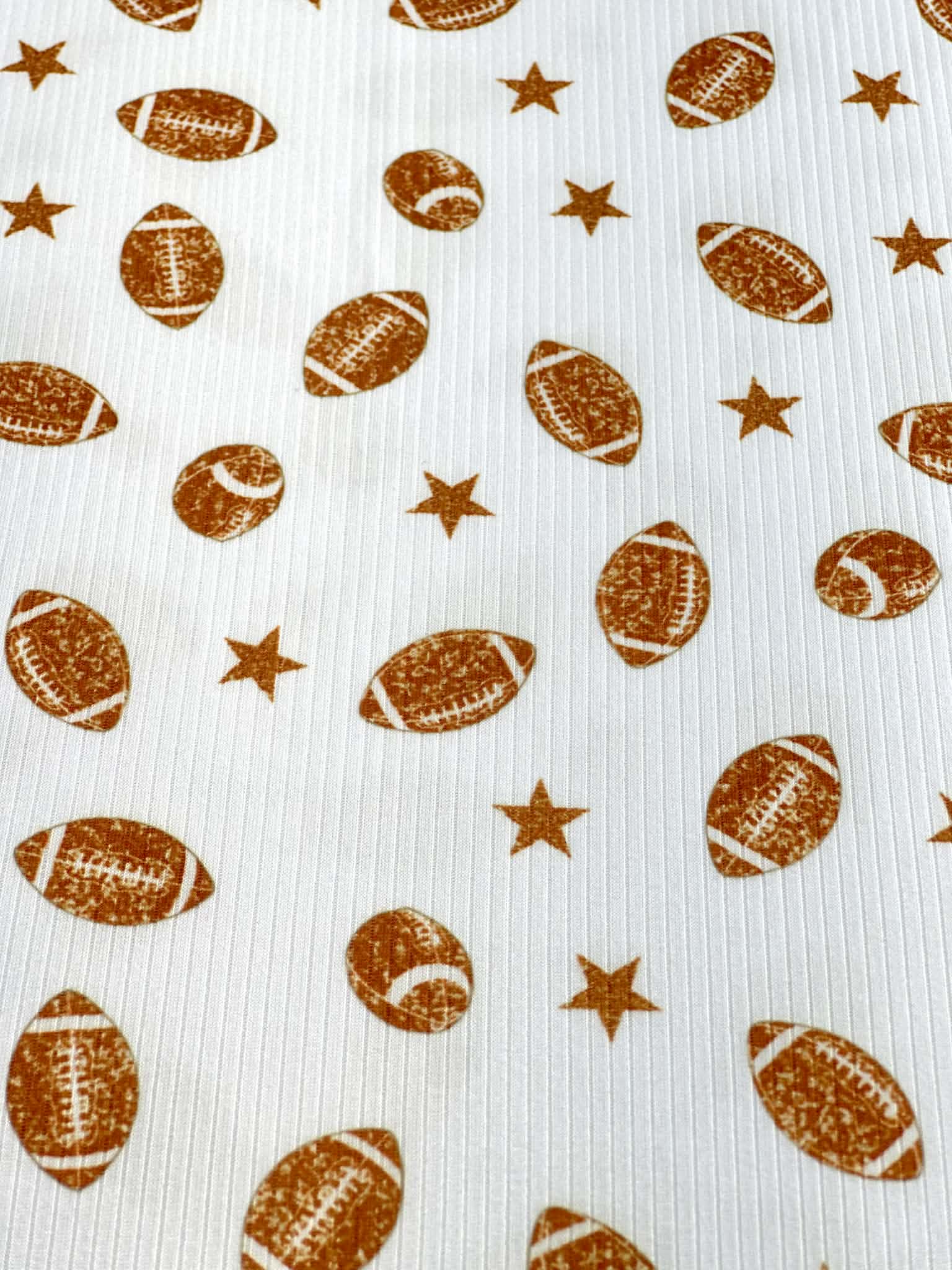 (4X2 YUMMY RIB) FOOTBALLS AND STARS ON OFF WHITE
