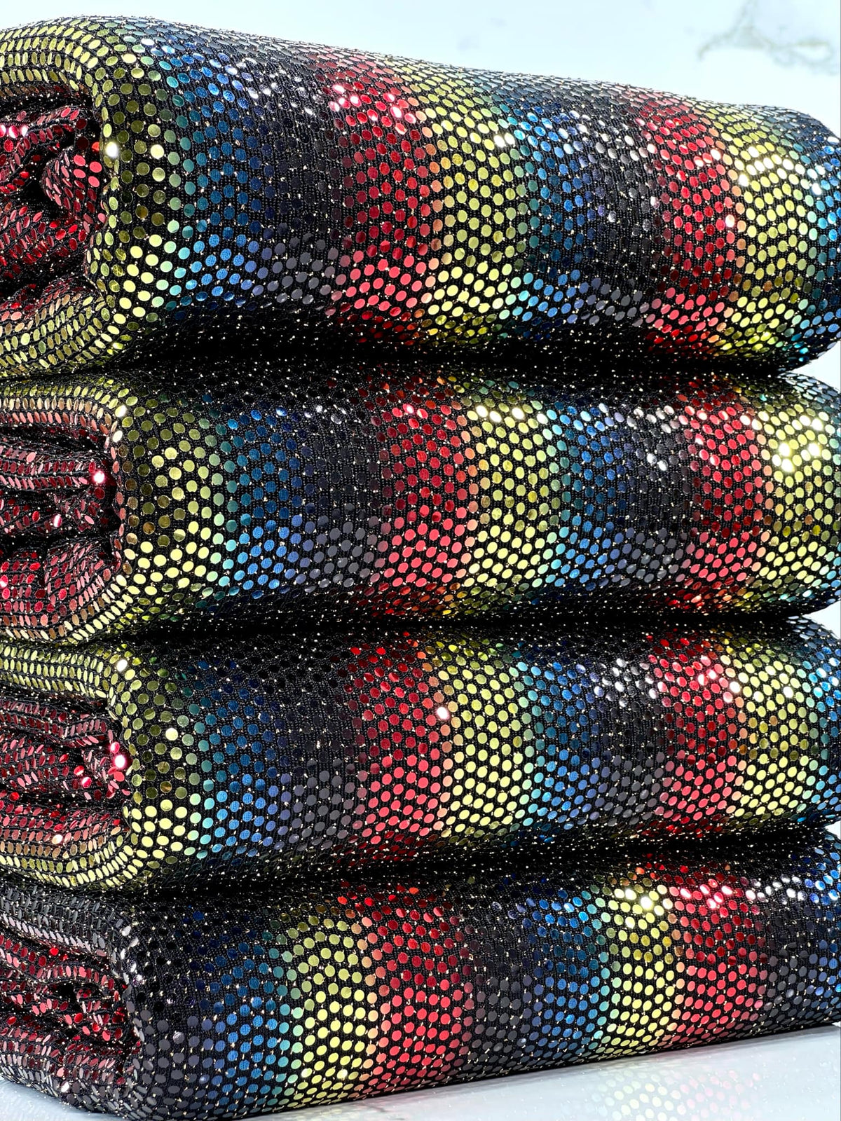 (SEQUIN KNIT) RED, BLACK, BLUE, AND GOLD FAUX DOTS ON BLACK