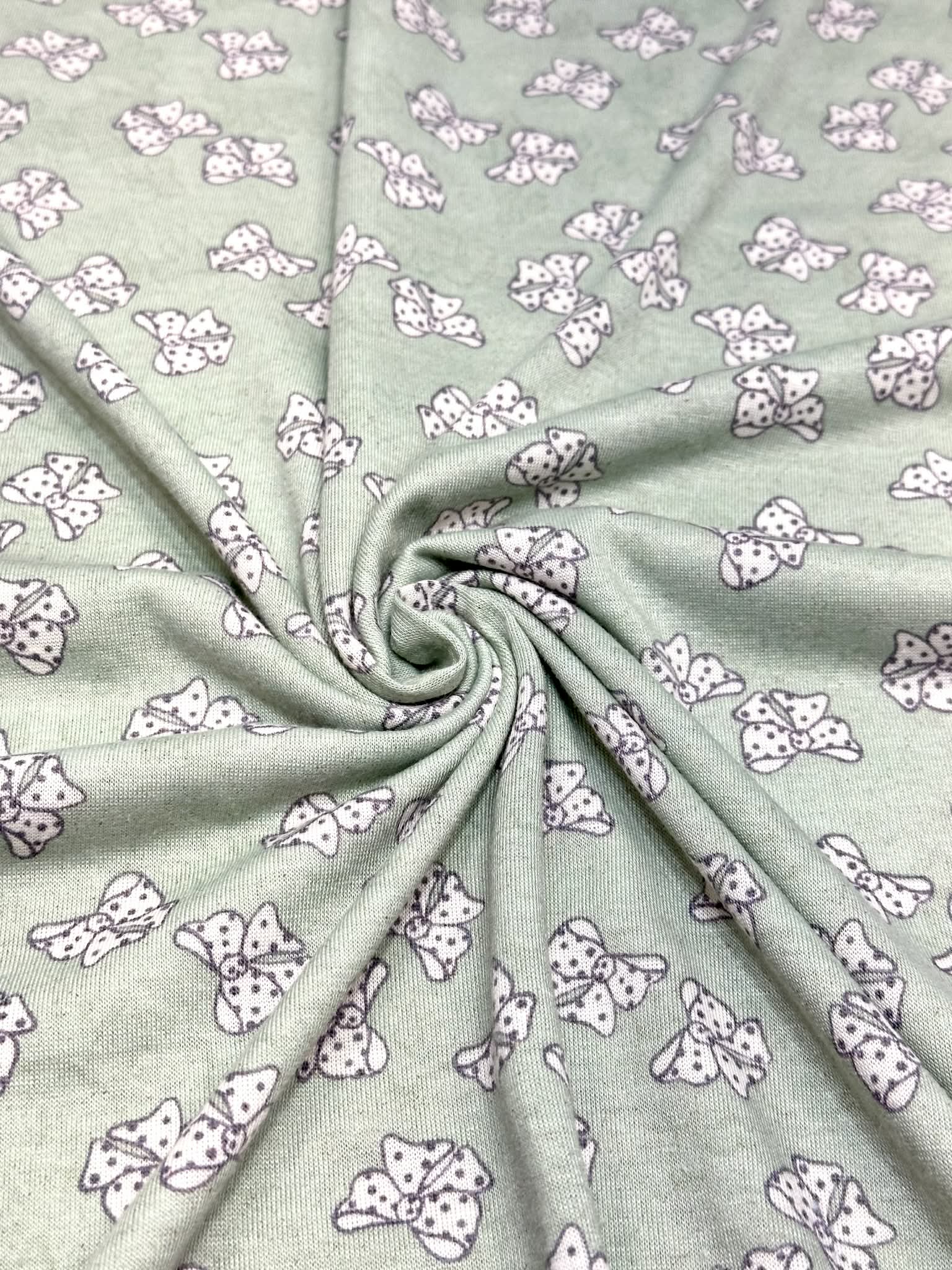 (KNIT) OFF WHITE POLKA DOT BOWS ON LIGHT SAGE