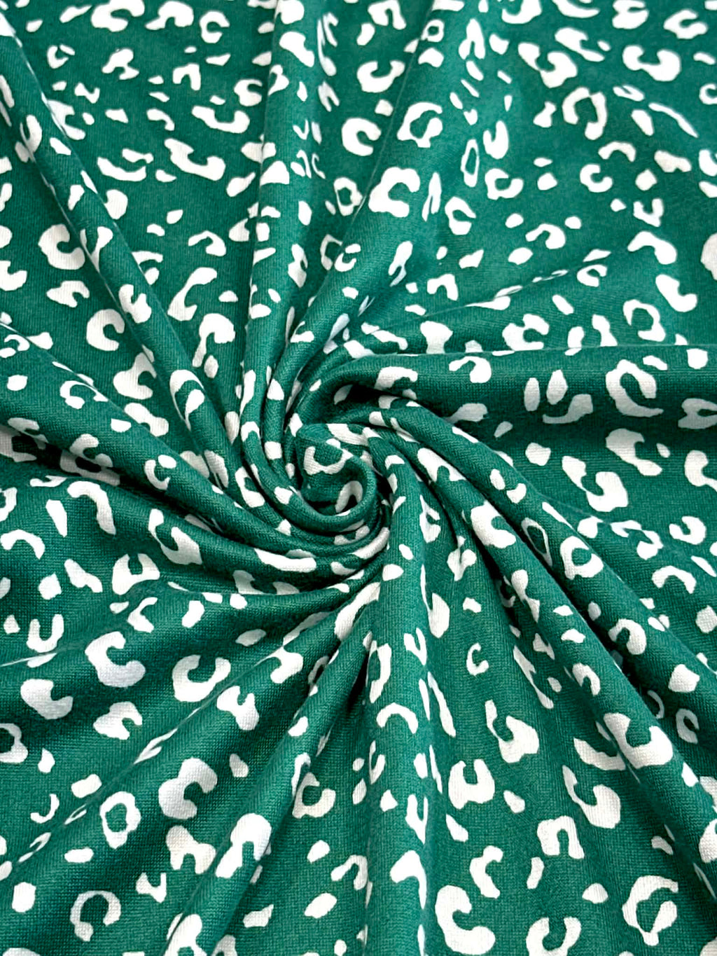 (DBP) TINY WHITE LEOPARD ON HUNTER GREEN