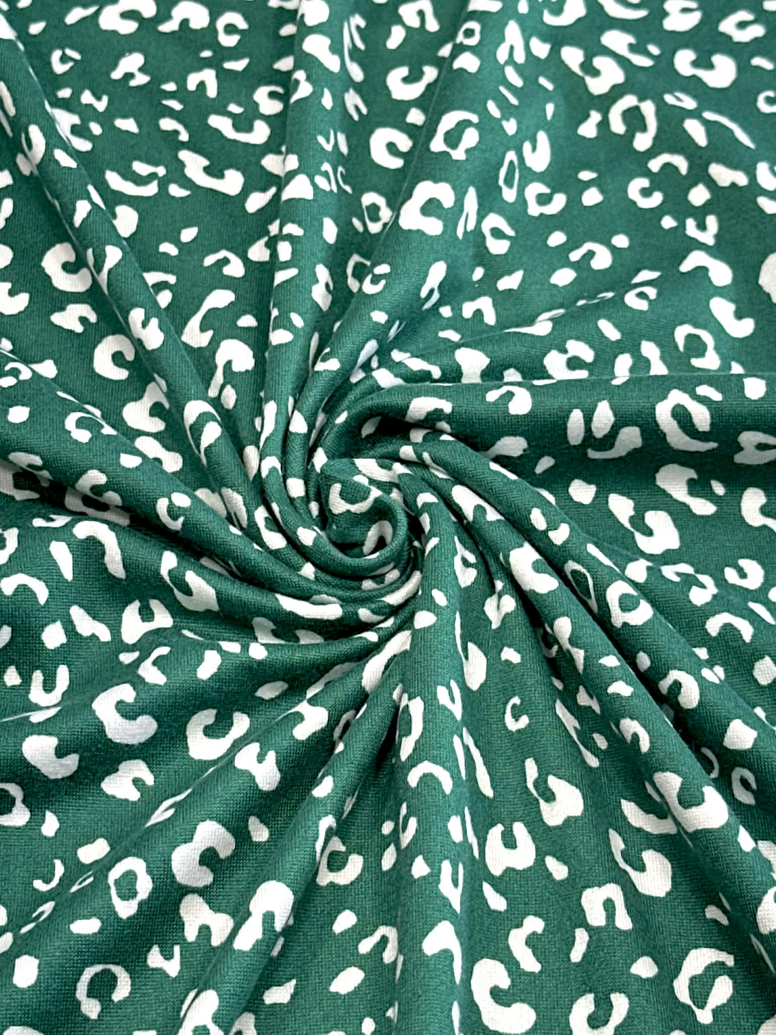 (DBP) TINY WHITE LEOPARD ON HUNTER GREEN