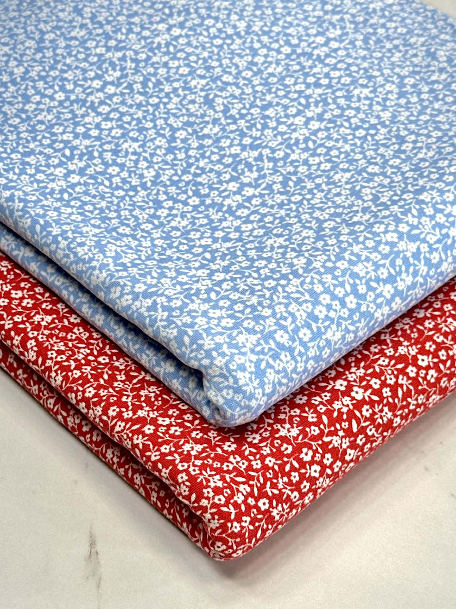 (DBP) TINY OFF WHITE FLOWERS ON RED(5)