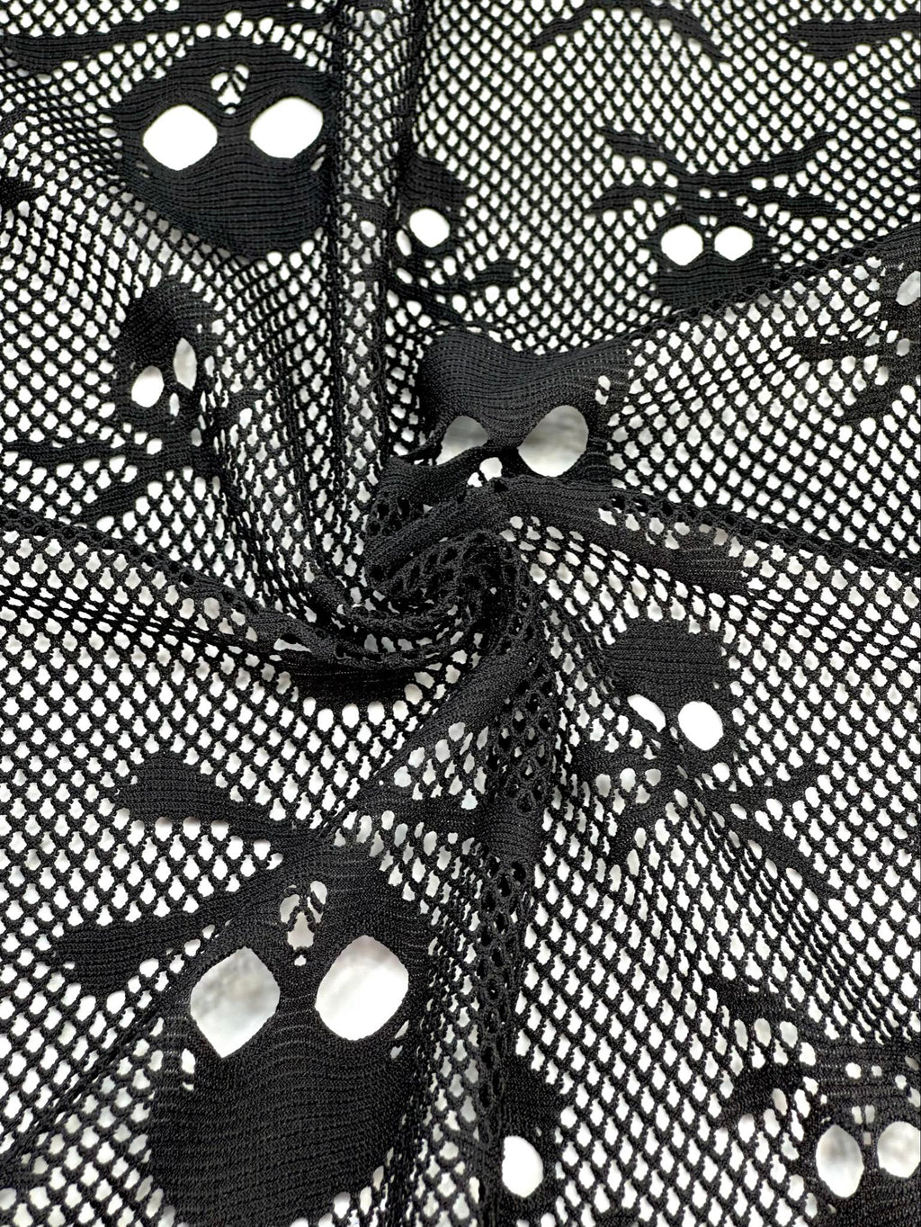 (JERSEY) SMALL AND MEDIUM BLACK SKULLS ON BLACK