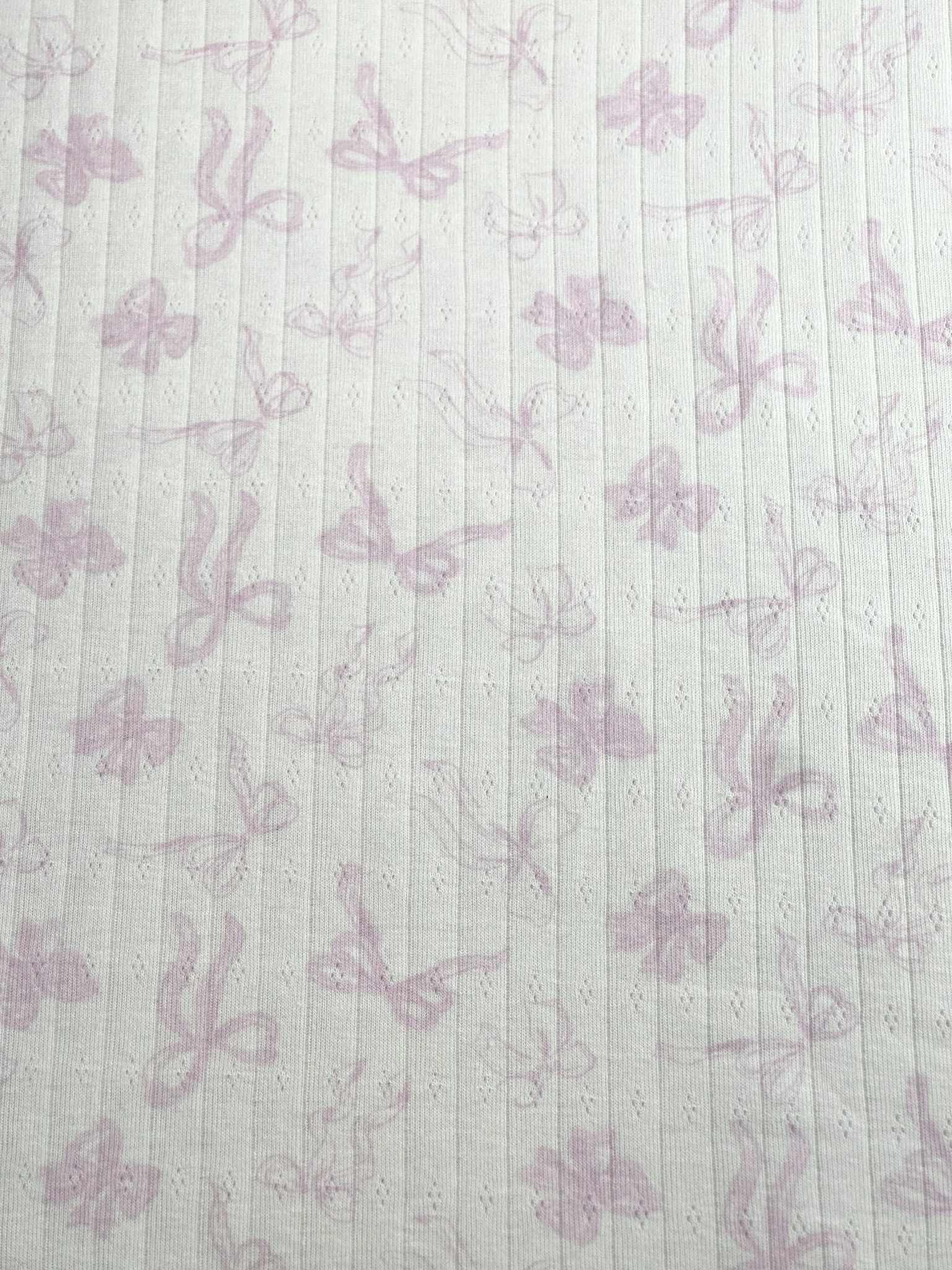 (POINTELLE COTTON SPANDEX RIB) PINK BOWS ON LIGHT CREAM