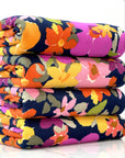 (SWEATER KNIT) PURPLE, ORANGE, YELLOW AND PINK FLOWERS ON NAVY